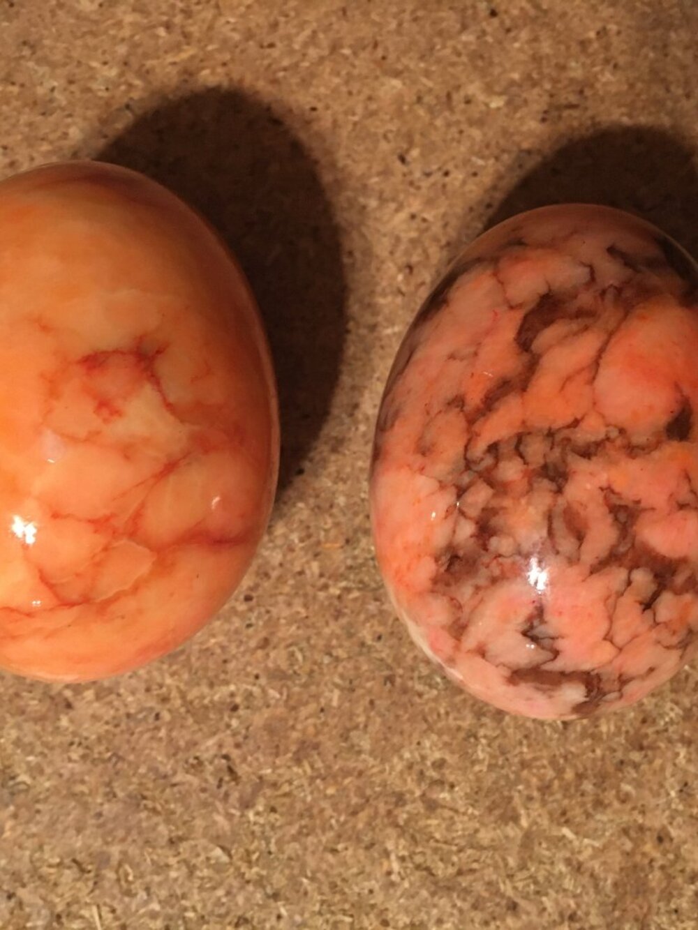 LOT OF TWO VINTAGE PINK/ORANGE ALABASTER MARBLED STONE EGGS